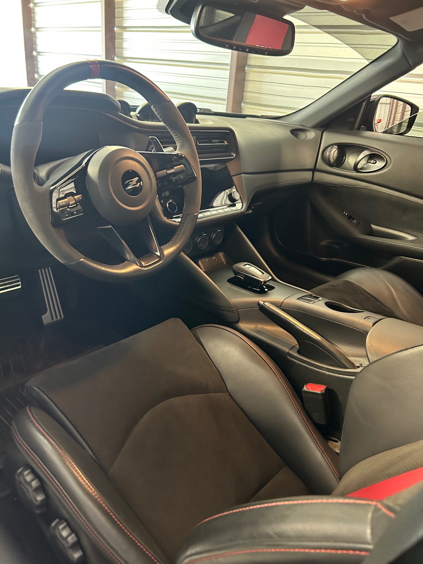 Nissan Z NISMO cabin with red-stitched sport seats