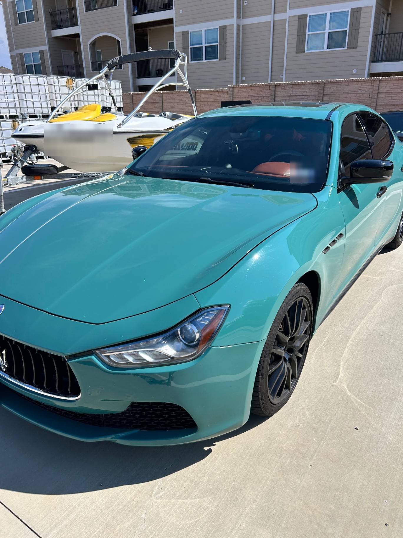 Front of the teal Maserati Ghibli